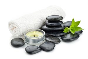 zen basalt stones and massage oil on the white..Others spa teme in this lightbox http://www.istockphoto.com/file_search.php?action=file&lightboxID=7989999